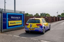 A car pulling into the car park at Luton Airport