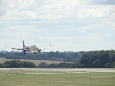A plane landing at London Luton Airport