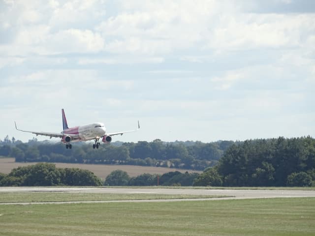 A plane landing at London Luton Airport