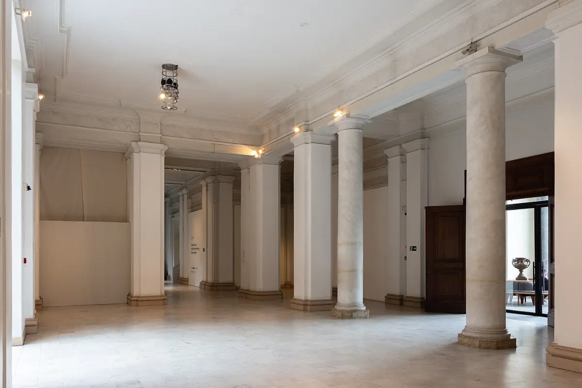 A quiet hall with stone columns
